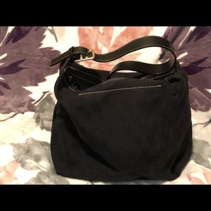 Black on black fabric classic dooney and Burke bag